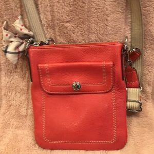 Coach crossbody purse.
